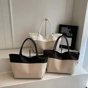 شنطة توت كلاسيكية,شنطة عمل نسائية,شنطة توت بلونين,شنطة جلد بيج وأبيض,شنطة توت واسعة,شنط كتف كلاسيك,شنط رسمية يومية,شنط سرح.