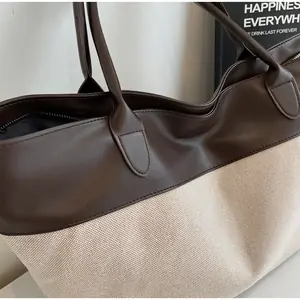 شنطة توت كلاسيكية,شنطة عمل نسائية,شنطة توت بلونين,شنطة جلد بيج وأبيض,شنطة توت واسعة,شنط كتف كلاسيك,شنط رسمية يومية,شنط سرح.