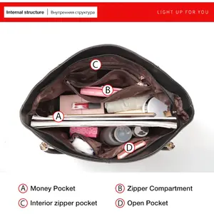 شنطة توت رمادية,شنطة كتف واسعة,شنطة جلد للعمل,شنطة رمادي فاتح,شنطة بمقابض مضفورة,شنط يومية عملية,شنطة كتف كلاسيك,شنط سرح.