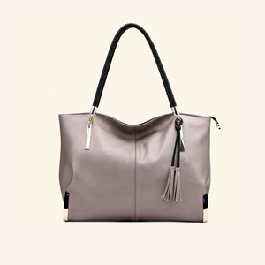 شنطة يد نسائية منسوجة بتصميم عصري أنيق